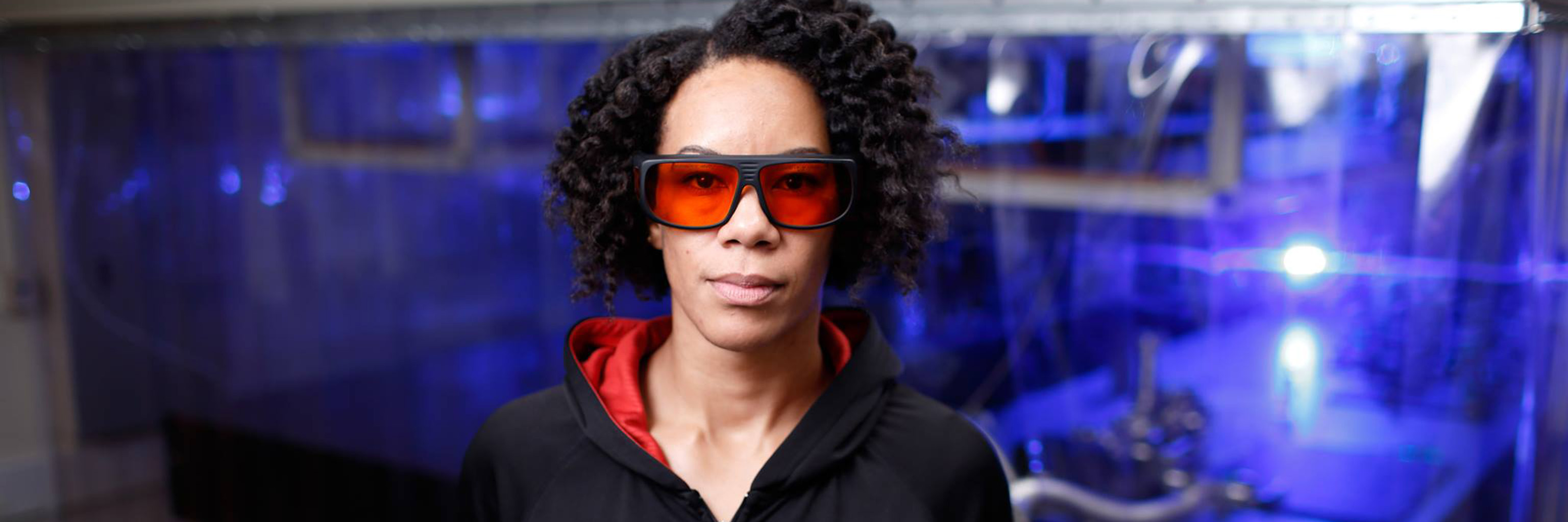 Woman wearing protective lab glasses